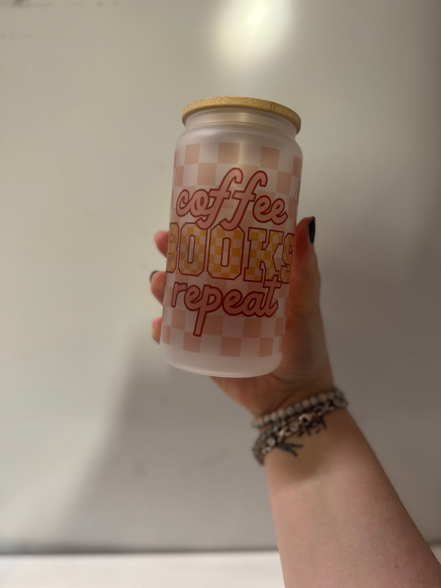 Coffee books repeat frosted glass cup